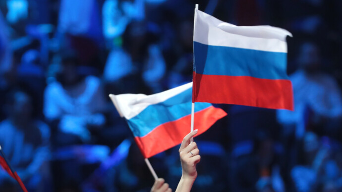 Американец вернул флаг России в международный спорт. Откуда взялся этот смельчак